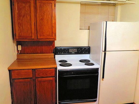 KItchen With Range And Refrigerator
