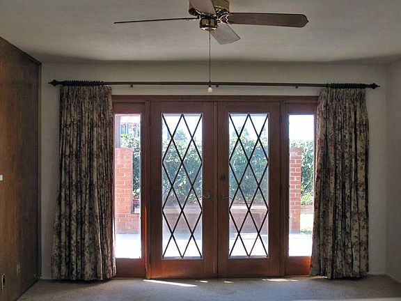 French doors to covered patio/backyard