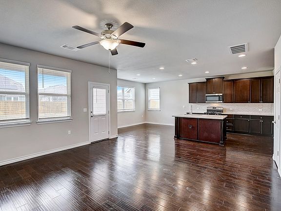 Open Living Room, Dining Room and Kitchen Areas