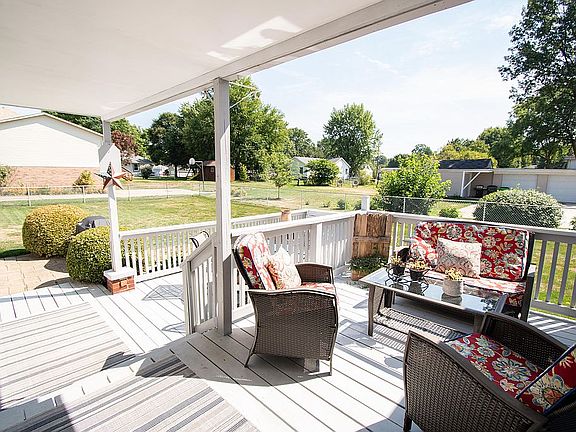 Partially under roof deck.