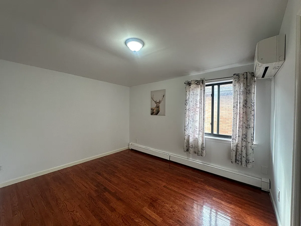 Building Photo - 56-54 148th St #2