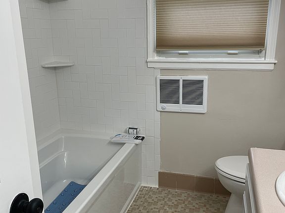 Brand new extra high tub and tile
Down up shade brand new