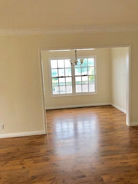 Large living / dining room with views of city