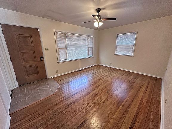 Wood floors in living room.