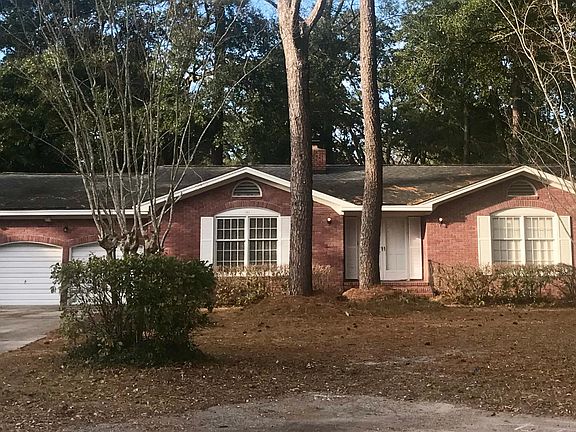 Lovely Brick Ranch with attached 2-Car Garage.