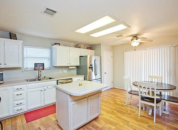 This kitchen/dinning space has great natural lighting. Open the blinds and enjoy a view of the backyard, or watch the kids play outside while you cook. This home makes multi-tasking easy.