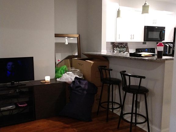 Granit counter tops on breakfast bar open to Living Rm 