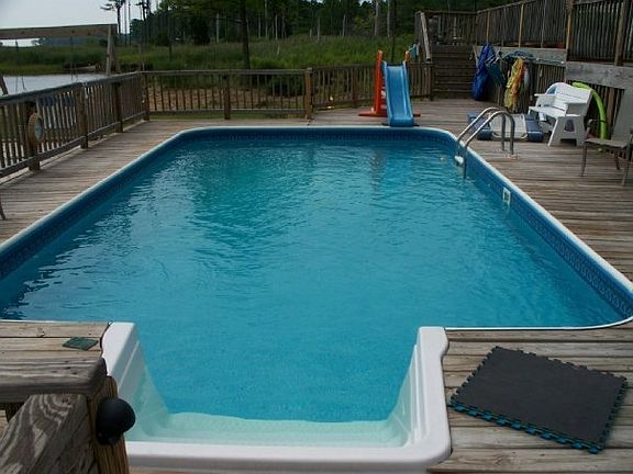 Inground pool with surrounding deck
						:
						14 x 26 foot pool, depth 3 feet to 5 feet. Pool requires very little maintenance