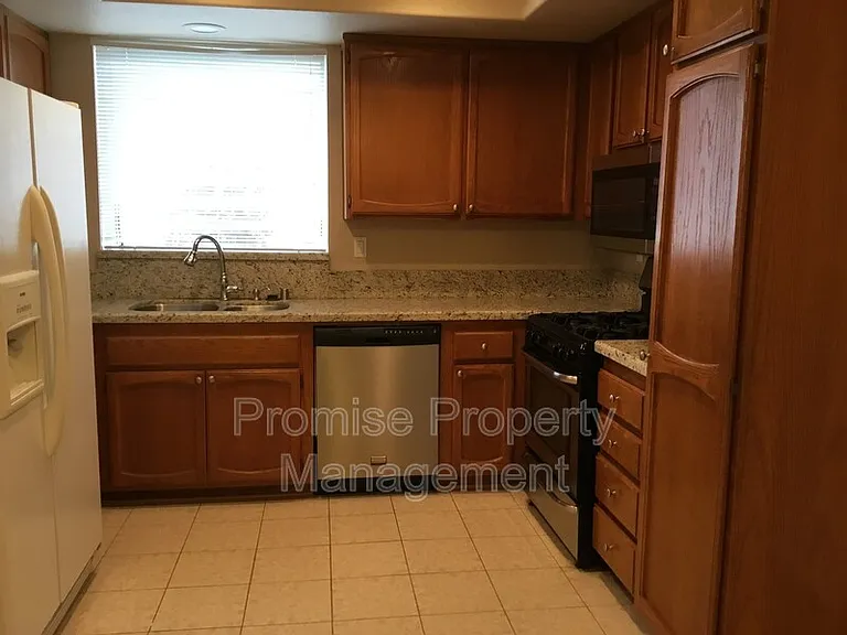 5247 Hubbert St — Photo 2