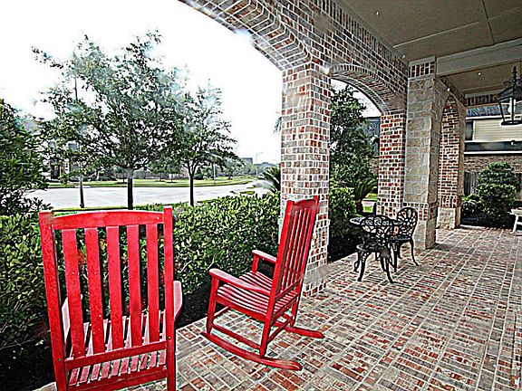 ADDITIONAL VIEW OF THE COVERED FRONT PORCH