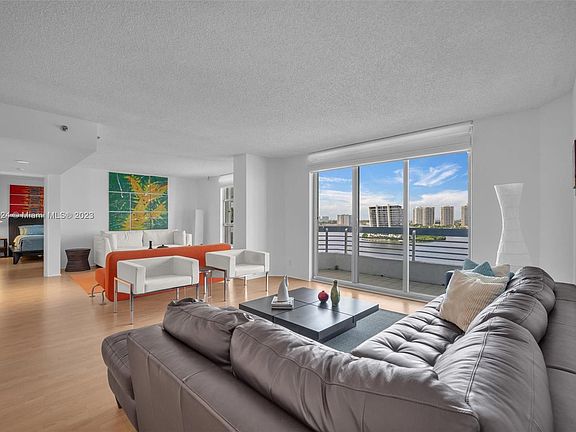3rd image of 3600 Mystic Pointe Dr APT 1405