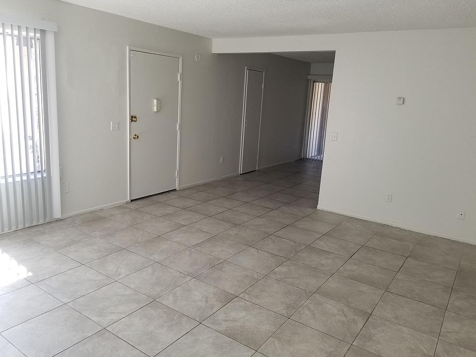 Spacious living room! Ceramic tile throughout!