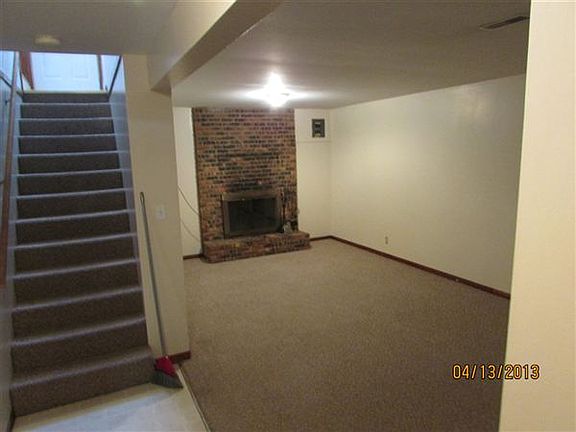 Attached Garage to Basement Living Room, laundry room to lef