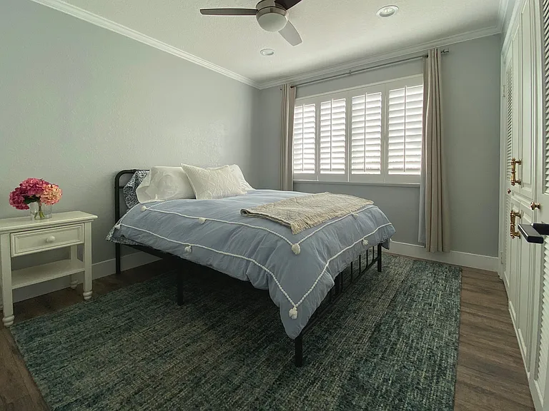 Bedroom 2 offers comfort and flexibility with a cozy queen bed_perfect for families or friends traveling together.