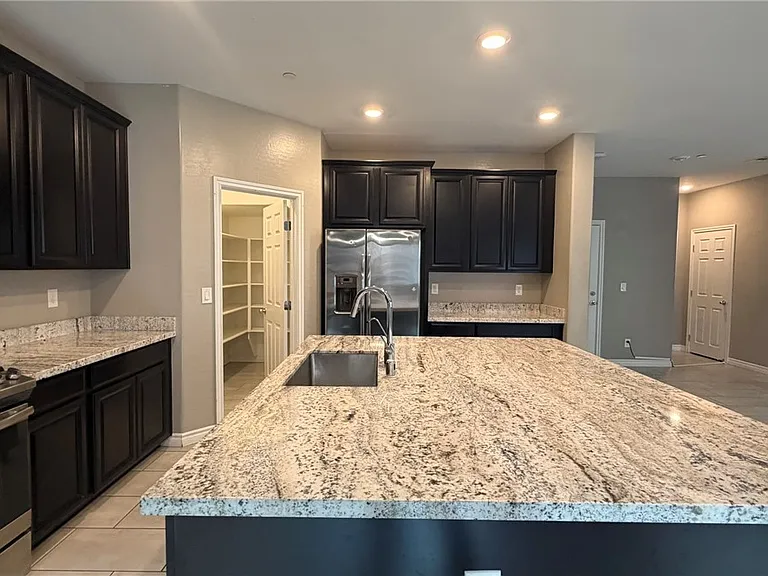 6943 Denio Island St — Photo 12