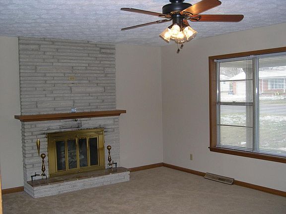 Living room with fireplace ...