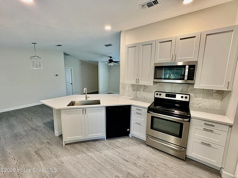 1274 Coral Reef Ave NW — Photo 9