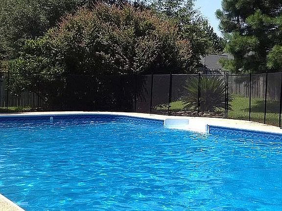 Pool with security fence