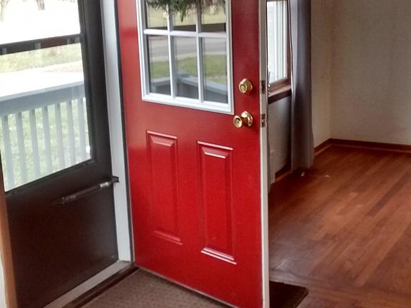 Front door leading into living room