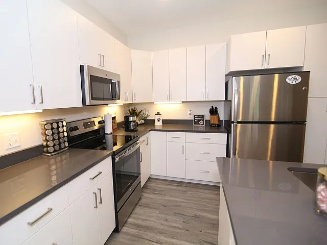 Flat Range Electric Stove and Mounted Microwave