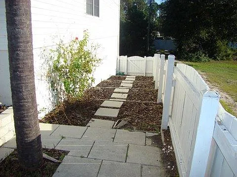 Terraced side patios, fully fenced in!