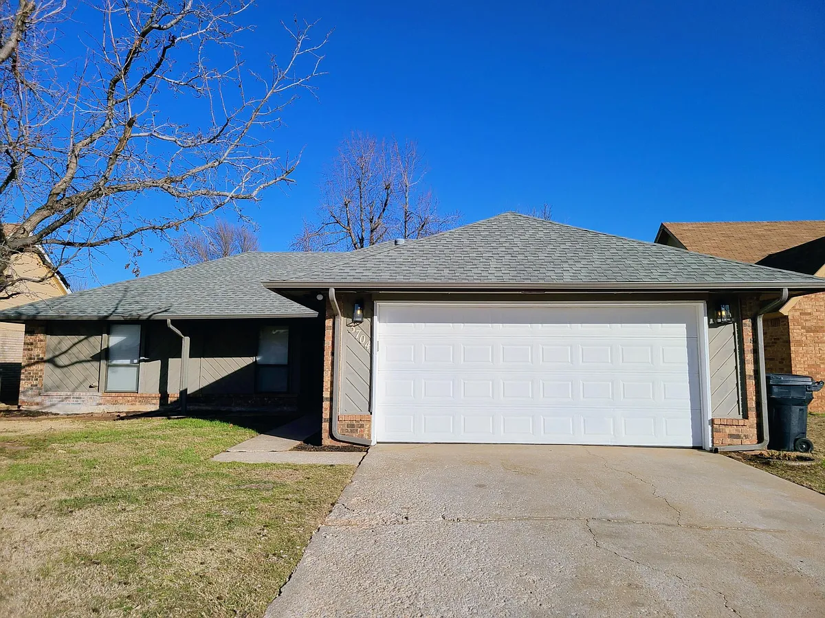 Home Exterior with Driveway, Two-car Garage with Opener and Keypad Access. - 3704 Summerwind Ave