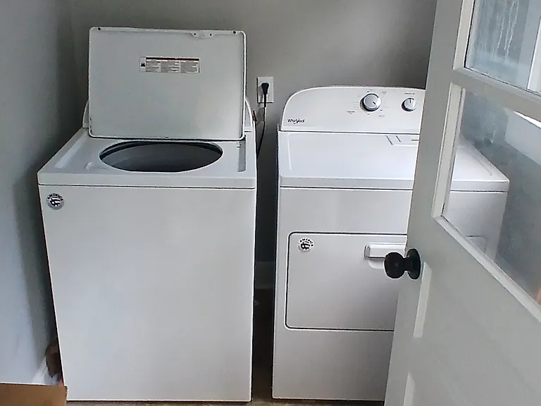 Laundry Room in Unit B, Unit A laundry room is slightly different, but does come with storage as well.