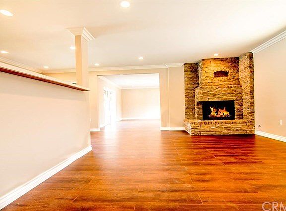 Enjoy this living room with the awesome fireplace stone
