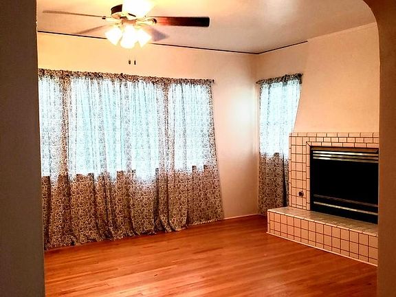 Formal Living Room with functional gas Fireplace. Perfect for the holidays and snuggling.