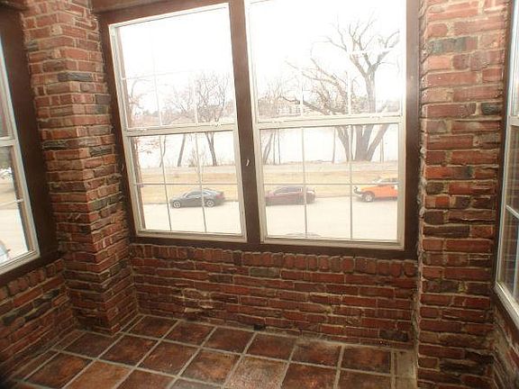 Private Entrance is Sun Porch overlooking the Arkansas River, steps from the Bike/Jogging Trail. Beautiful brick and Saltillo Tile.