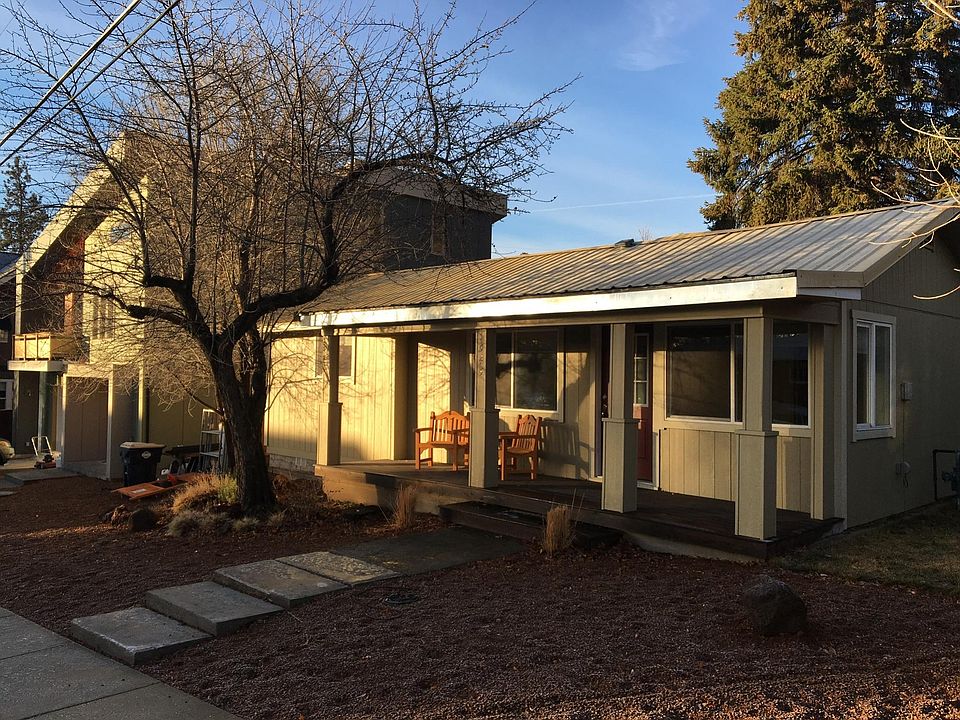 Side view of front porch and apple tree