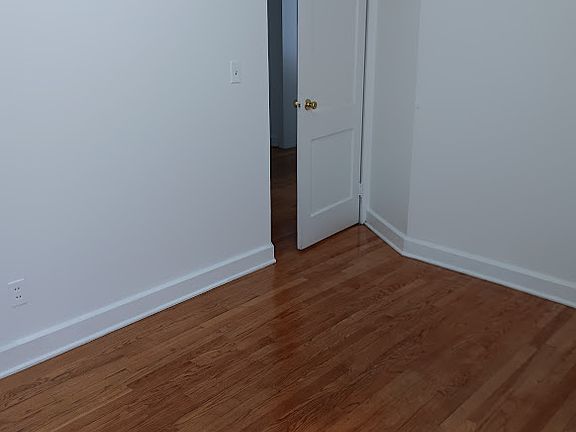 Another view of the Living room. First Floor Apartment Entrance doorway into Living room from building Hallway.