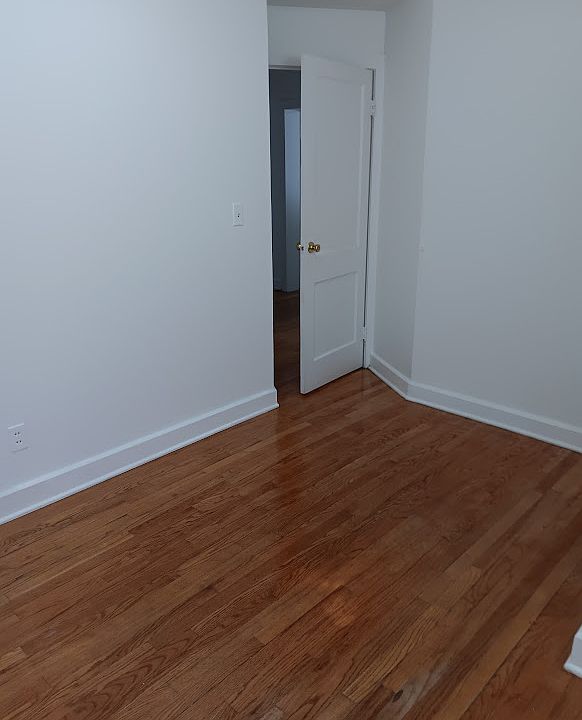 Another view of the Living room. First Floor Apartment Entrance doorway into Living room from building Hallway.
