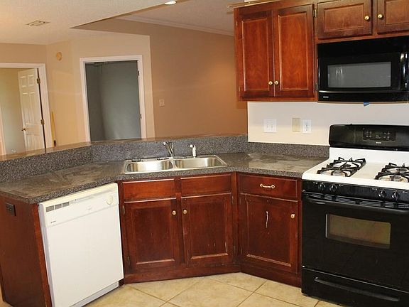 The kitchen is open to the  family room.
