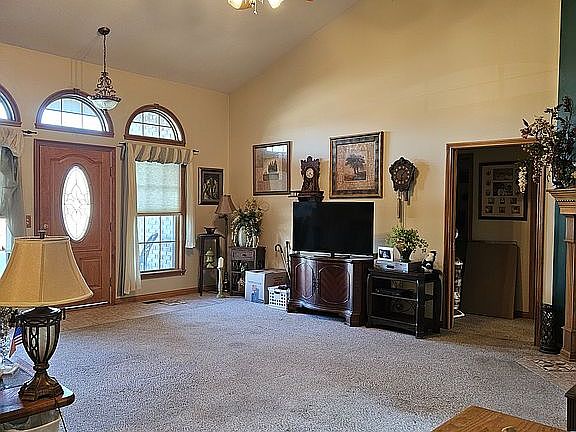Living room with vaulted ceiling