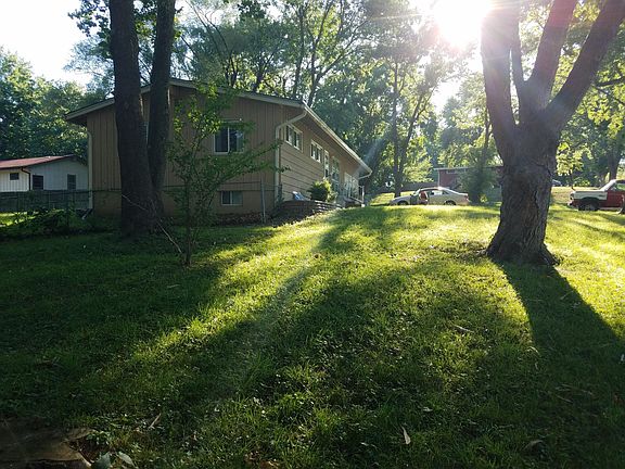 view from the left side of the front very shady yard 