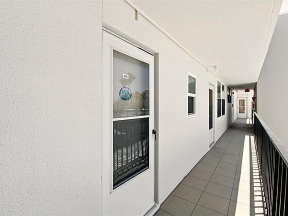4th image of 7625 SUN ISLAND DRIVE S #304