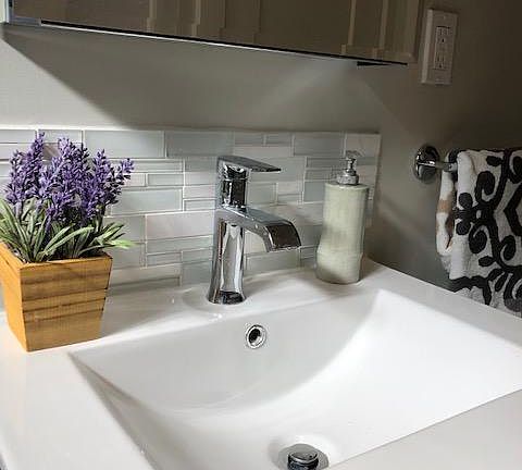 Two brand new bathrooms with beautiful glass/marble details.