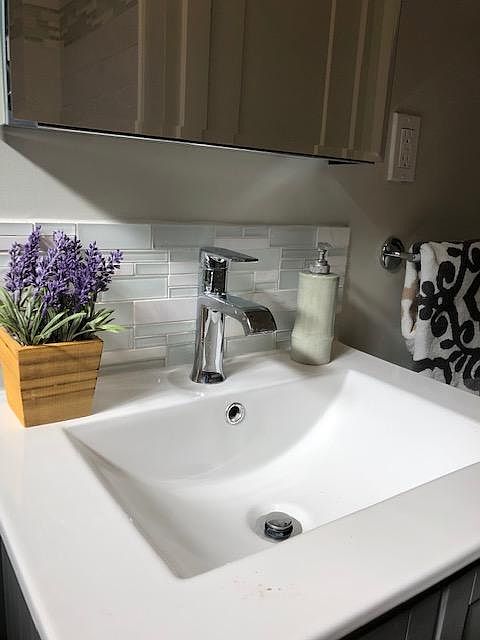 Two brand new bathrooms with beautiful glass/marble details.