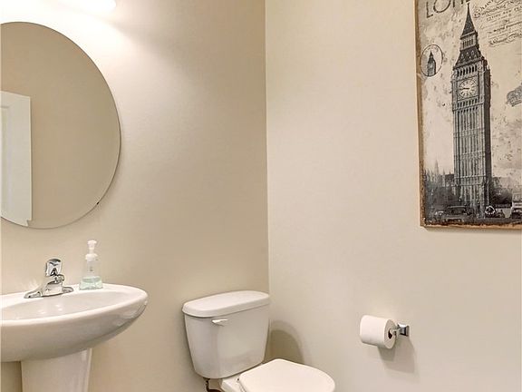 Powder room on main next to office.