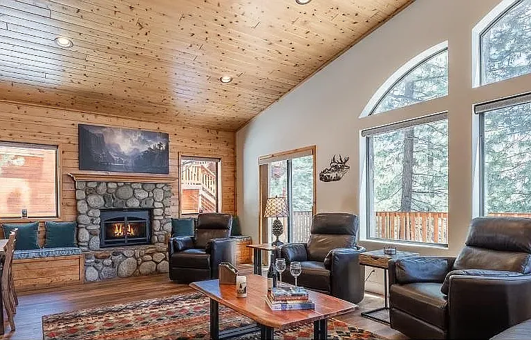 Spacious Living Room with Fireplace & Mountain Views