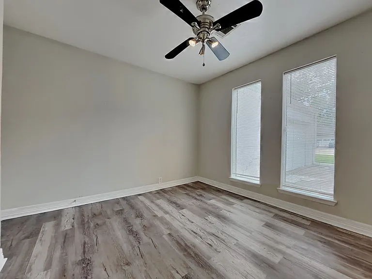 Spacious room with neutral gra