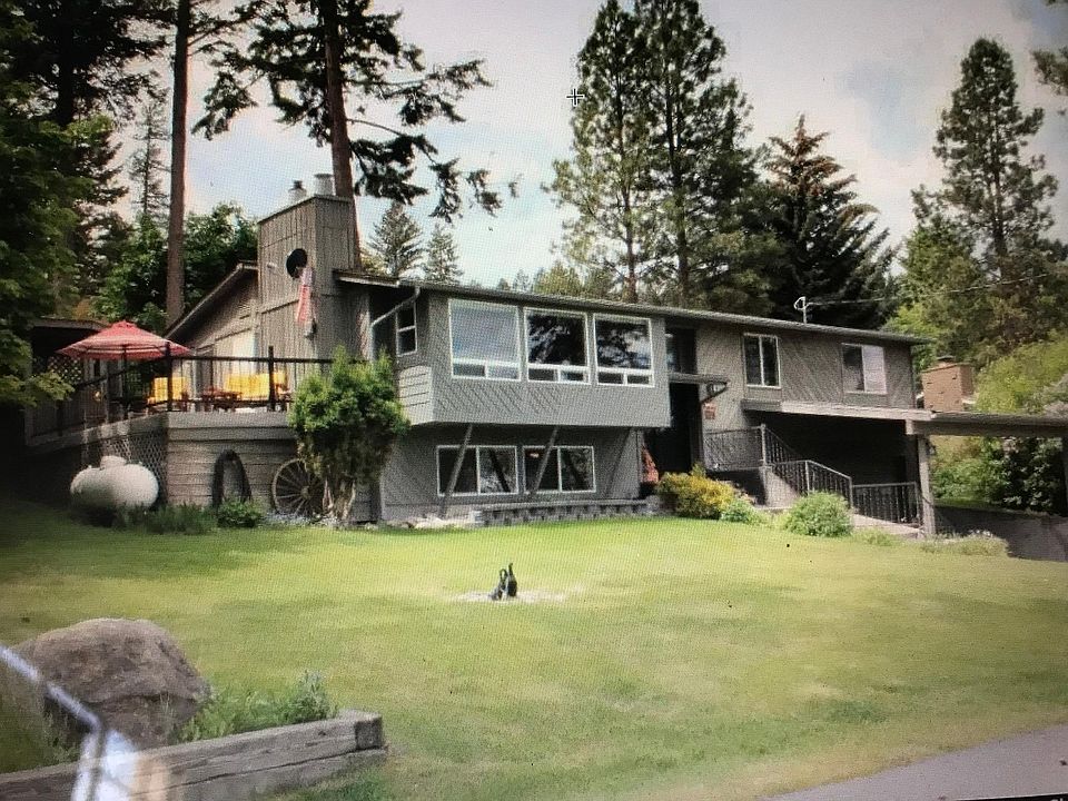 Front Yard and driveway with view of the deck.