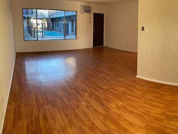 Living Room View with Pool Showing