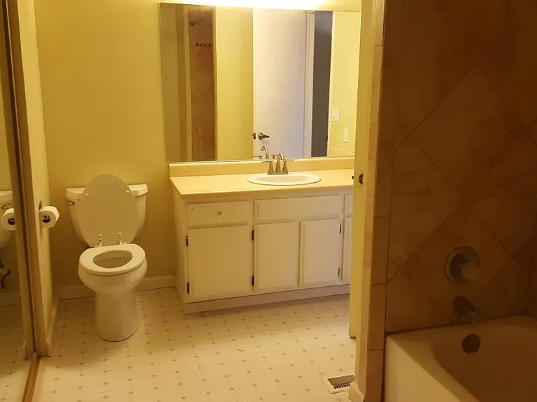 master bathroom with shower and tub. large closet