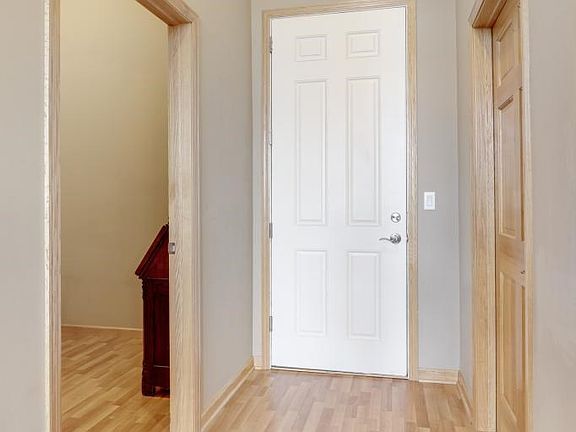 Please come in and find  the laundry room to your left and den to your right