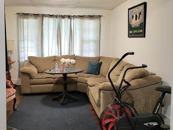 Living Room with tenant's furniture. The house is not furnished