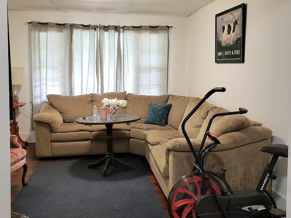 Living Room with tenant's furniture. Tenant will be moved out by Oct. 21st or 22nd