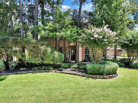 The street view of the home. The neighborhood is very walkable with wide streets.