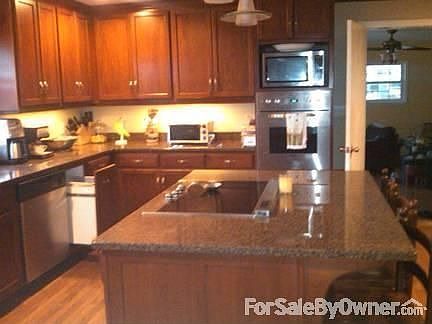 Professional Kitchen : Granite countertops, custom cherry cabinets, Viking stainless steel appliance